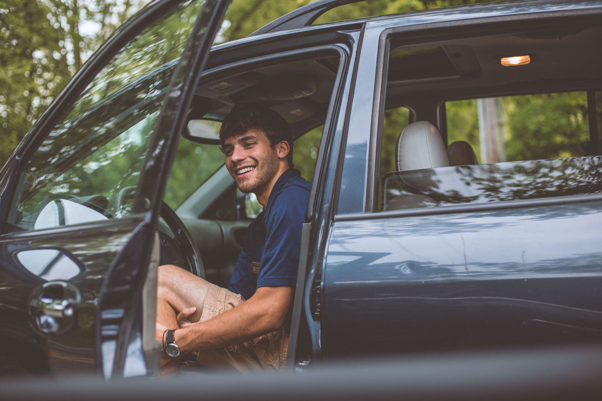 man in car